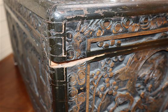 A Chinese carved camphorwood trunk W.90cm